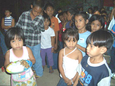 The children learn to ask Jesus to bless their food and thank Him for His gift